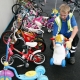 A member of staff at Pinbrook Recycling Centre sorts our children's ride on toys for resale in the Reuse Shop