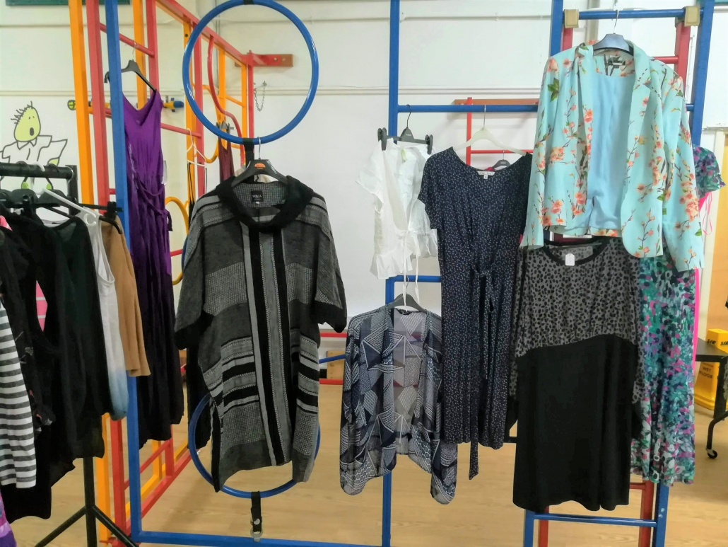 Picture of clothes hanging on a climbing frame in the school hall at Marpool Primary school