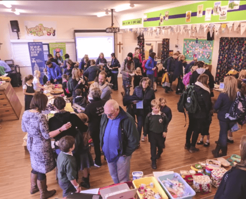 Photo of a crowd of people at St Peter's Budleigh school engagement eco-day.