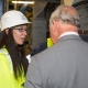 Image of woman in hard hat and high viz jacket talking about the Energy from Waste plant