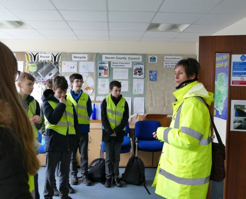 Sally explains the 3Rs to a group of secondary pupils on a school trip to Pinbrook Recycling Centre