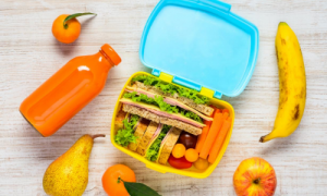 Reusable lunchbox with drinks bottle and fruit