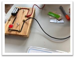 Picture of a circuit board used in experiments to measure conductivity of different materials in the Science of Materials workshop.