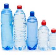Several plastic bottles standing in a line
