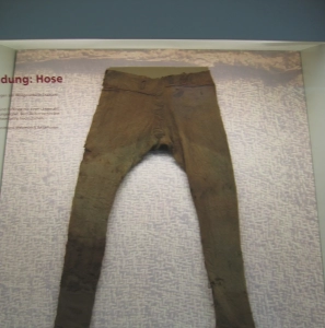 Image of brown old trousers on display