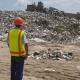 Worker at landfill site